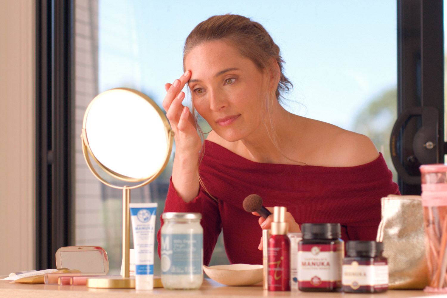 Woman applying Manuka Honey to Benefit the Skin